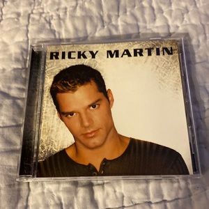 Ricky Martin CD featuring “Livin’ La Vida Loca”